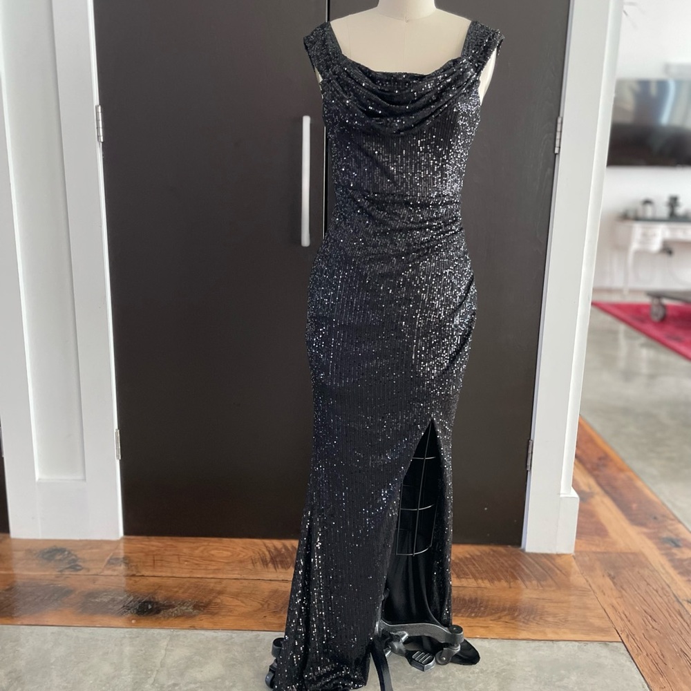 Fitted black sequin dream dress.